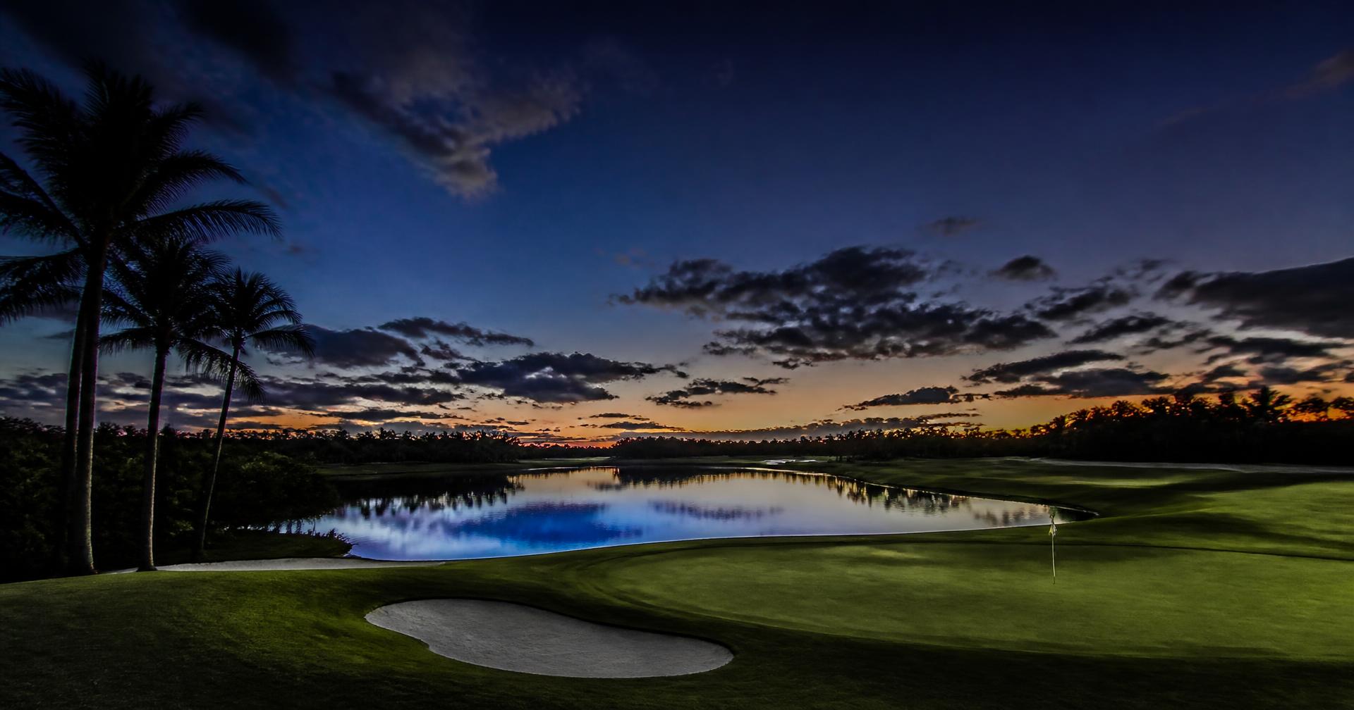 Championship golf hole at dusk